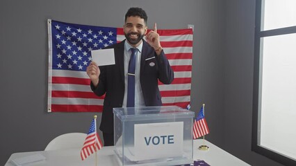 Wall Mural - Young, happy hispanic man as american electoral college candidate, expressing his idea, pointing with one finger and soliciting votes for government with a question numbered one