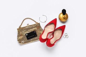 Poster - Female shoes with handbag, credit card and accessories on white background