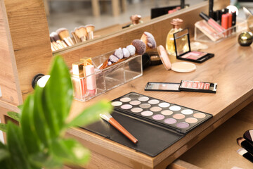 Wall Mural - Makeup products on table in dressing room, closeup