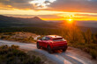 © MVProductions - rental car in spain mountain landscape road at sunset