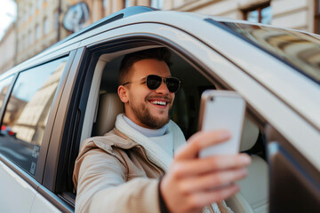Wall Mural - Young man in a car taking a selfie with his phone.