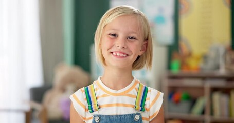 Canvas Print - Girl, child and face or happy in classroom for education, knowledge or fun learning with confidence. Student, person and portrait with smile at kindergarten for studying, pride and academy or school