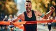 © CHAWA GEN - A high-resolution image of a runner breaking the finish line tape, showing feelings of triumph and joy, with space for promotional text