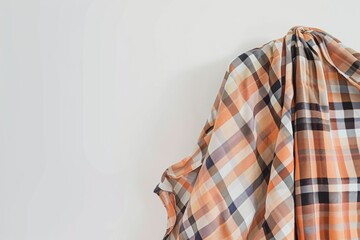 Poster - Elegant Check Pattern Dress on White Background Showcasing Timeless Fashion Appeal in Studio Lighting