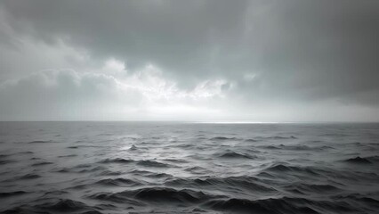 Wall Mural - a panoramic view of a calm ocean meeting dark and stormy skies a result of an atmospheric rivers inf