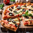 © shaadjutt36 - Delicious pizza topped with cheese, tomato on wooden table. Pizza surrounded by natural fresh ingredients mozzarella, basil, garlic and tomato.