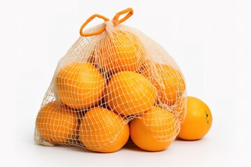Oranges in red net isolated on white close up
