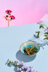 Wall Mural - Spicy smashed cucumber salad in Asian style; a fresh and creative culinary presentation with a surreal summer vibe