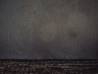 Wall Mural - silver painted cardboard surface for copy space.