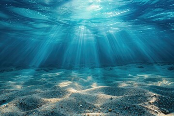 sea. underwater background with beautiful light rays and sandy floor