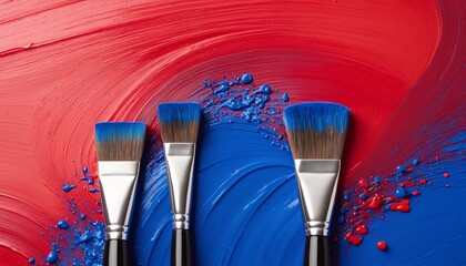 Close-up of red and blue paint on a paintbrush. A paintbrush meticulously blending gradients of color together on a canvas, creating smooth transitions and depth within the painting.