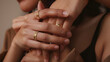 © Daniel - Close-up of female hands showing her golden rings. Horizontal mock-up.