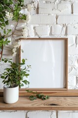 Poster - A picture frame sitting on a wooden shelf next to a potted plant. Suitable for home decor or interior design concepts