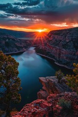 Poster - Scenic view of sun setting over a tranquil lake in the mountains. Suitable for travel and nature themes
