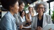 © Kiran - A diverse group of business people were having fun, Multiracial teamwork portrait of big group of colleagues. Corporative lifestyle of a diverse office workers in a financial center