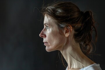 Poster - A close up shot of a woman holding a cell phone. Suitable for technology and communication concepts