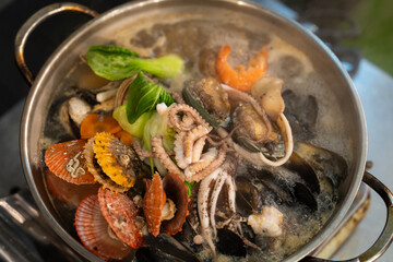 Wall Mural - View of the seafood stew in the pot