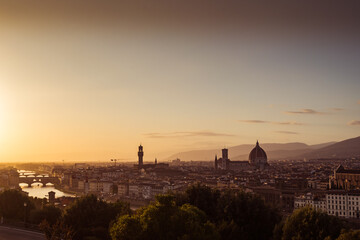 Wall Mural - Dark silhouettes of Firenze city landmarks at sunset and bridges over the Arno river, ITALY