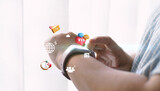 Fototapeta  - Social media icons on watchphone. Media marketing concept..