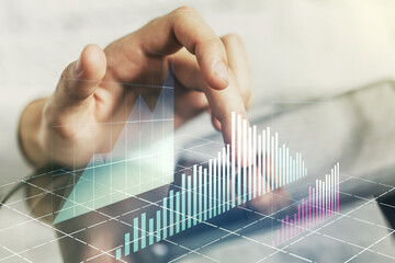 Poster - Double exposure of abstract creative financial diagram with finger clicks on a digital tablet on background, banking and accounting concept