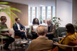 © Johnér - Businesswoman explaining strategy to colleagues in in meeting at office