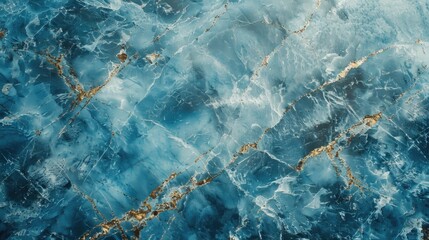 Wall Mural - A blue and gold marble wall with a blue background. The marble is shiny and has a metallic look