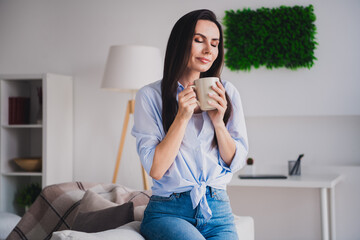 Sticker - Portrait of pretty lady closed eyes smell fresh coffee wear shirt bright interior apartment indoors