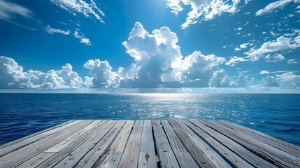 Wall Mural - wooden floor, blue sky and white clouds, sea background, blue ocean, perspective view of the wooden 