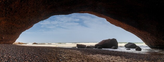 Wall Mural - panorama landscape view of the beach and rock arch at Legzira on the Atlantic Coast of Morocco