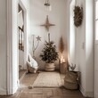 © somchit - Cozy, minimalist holiday decor in a small hallway with a small decorated Christmas tree and rustic, natural elements.