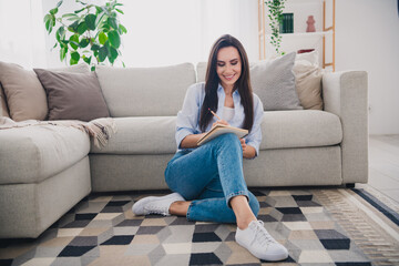 Canvas Print - Full length portrait of pretty lady sit floor write notepad wear shirt bright interior apartment indoors