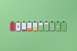 © Marc Tran/Stocksy - Paper cut battery icon collection with charging level