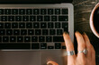 © DZ FILM/Stocksy - Women hand on laptop keyboard