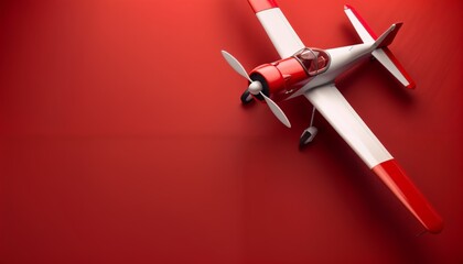 Streamlined electric toy plane on crimson red background with copy space