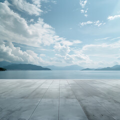 Wall Mural - there is a large empty concrete floor with a view of the water