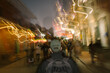 © Maryanne Gobble/Stocksy - Man Waking Down Crowded Bourbon St in New Orleans at Night