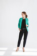 © Lea Csontos/Stocksy - Attractive business woman standing and posing in a white studio.