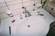 © DZ FILM/Stocksy - Cosmetics on the sink