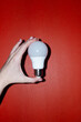 © Colour Laboratory/Stocksy - Hand holding  light bulb representing new idea, ideation, eureka