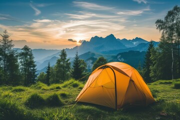 Poster - Idyllic camping setup with a tent overlooking a stunning mountain range during a vibrant sunset