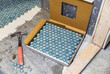 © Raymond Forbes LLC/Stocksy - Tile Construction in Residential Home renovation sponge