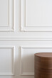 © Andriy Bezuglov/Stocksy - Closeup view at wood furniture inside white room