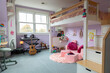 © Raymond Forbes LLC/Stocksy - Girl Child's bedroom interior decor in home with bunk bed and guitar