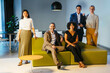 © BONNINSTUDIO/Stocksy - Group of diverse financial businesspeople at workspace