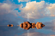 © Marcos Osorio/Stocksy - Ladder to cloud over tranquil waters