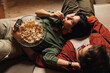 © Brat Co/Stocksy - Movie and Popcorn Night