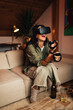 © Brat Co/Stocksy - Woman with VR Glasses