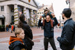 © Serena Burroughs/Stocksy - family at quincy market in boston together during holiday season