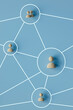 © Giada Canu/Stocksy - Abstract Social Network with Wooden Figures