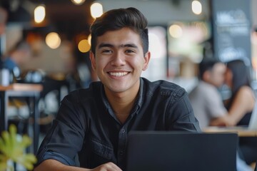 smiling young entrepreneur working at modern office workspace success and determination concept